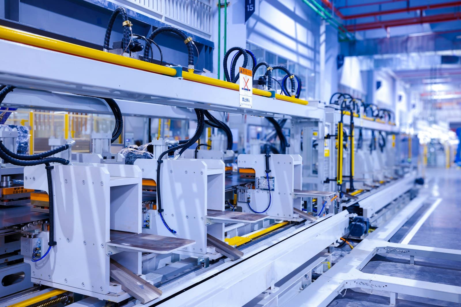 Equipment along a refrigerator manufacturing production line