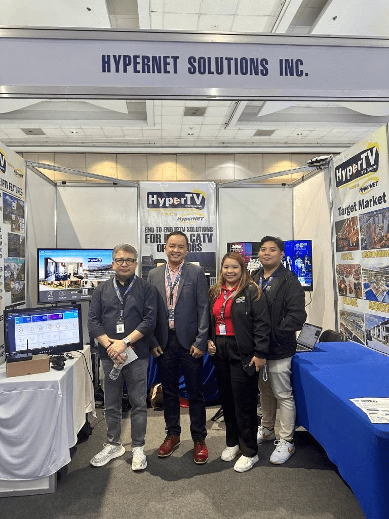 Four Hypernet representatives at the Hypernet Solutions exhibition booth